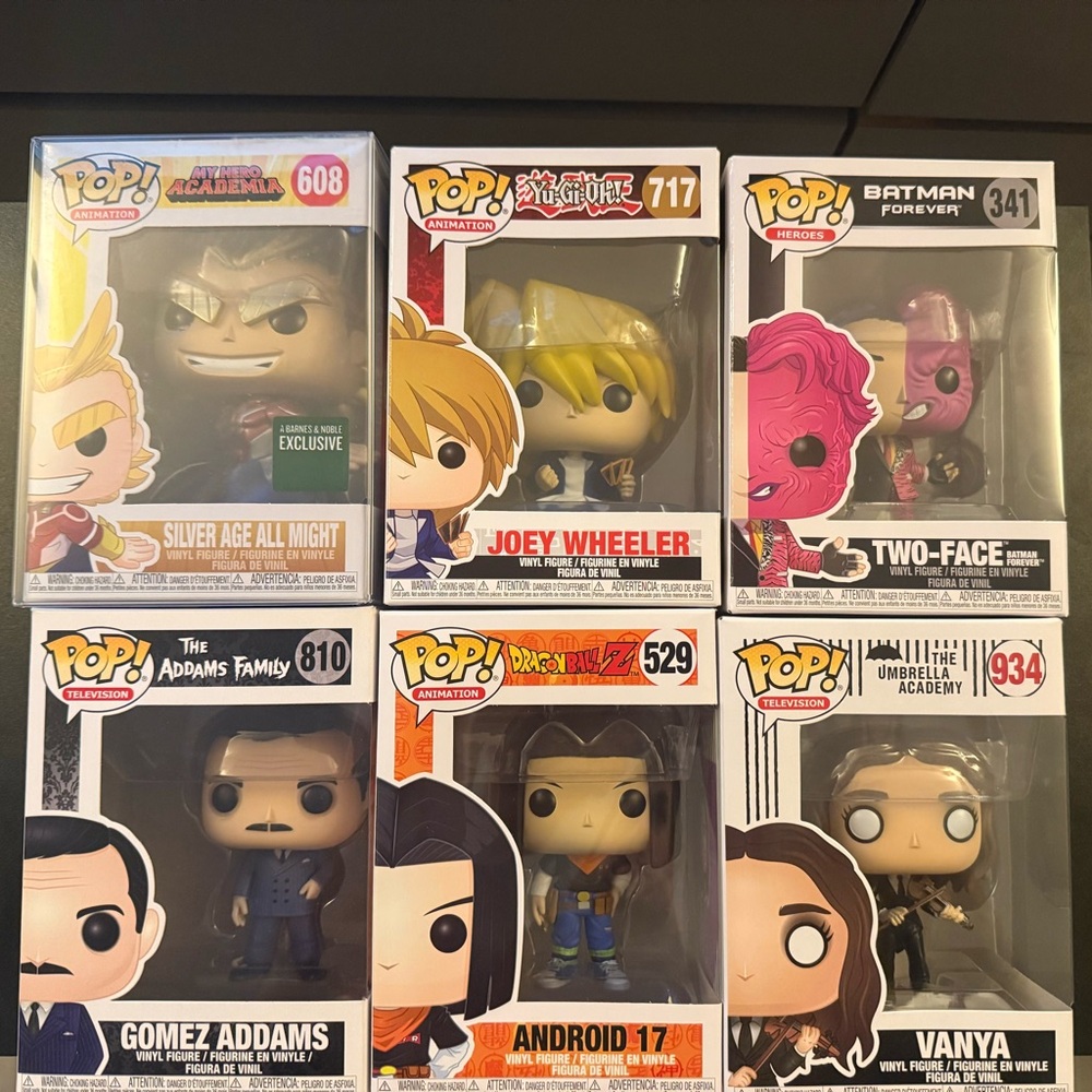 Funko Pop! Vinyl Figures Set – Pink, Yellow, Black, Silver